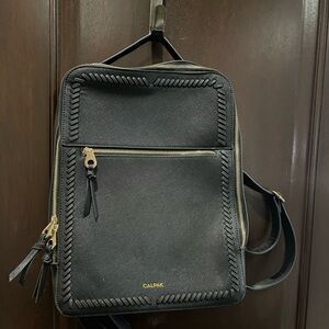 Black CalPak with gold zippers